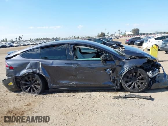 ✅ 2022 Tesla Model X • VIN: 7SAXCBE50NF329900 • Лот: 43708884. Опубликован ранее на IAAI с пробегом Не указан. Бесплатный доступ к архиву аукционных продаж из США и подробный отчёт об истории автомобиля на DreamBid. Изображение 14.