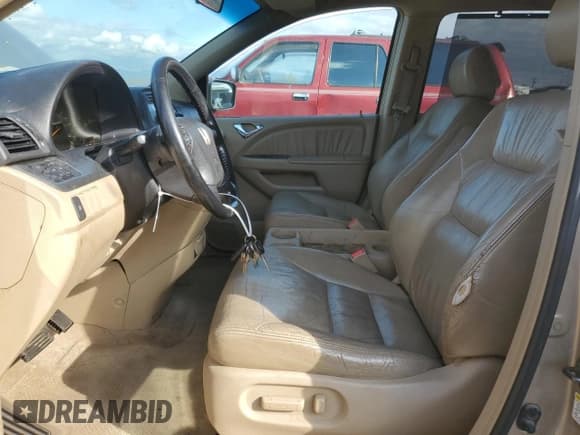 ✅ 2006 Honda Odyssey EX-L • VIN: 5FNRL38686B405106 • Lot: 87073935. Listed on Copart with 217,789 mi. Free auction sales archive from the USA and detailed vehicle history report at DreamBid. Image 7.