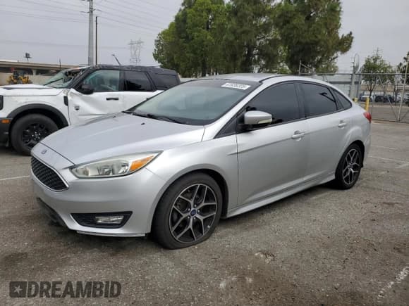 ✅ 2015 Ford Focus SE • VIN: 1FADP3F28FL348729 • Lot: 61936225. Listed on Copart with 107,351 mi. Free auction sales archive from the USA and detailed vehicle history report at DreamBid. Image 1.