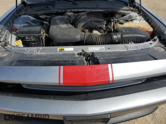 2014 Dodge Challenger SXT z VIN 2C3CDYAG0EH139872, wystawiony jako Copart lot #68122374 z przebiegiem 113 207 mil mil oraz Szkoda całkowita • Salvage title. Historia ofert i sprzedaży dostępna na DreamBid. Obrazek 11.