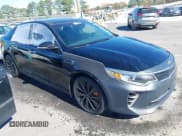 ✅ 2016 Kia Optima SX Turbo • VIN: 5XXGW4L27GG021616 • Lot: 43659883. Listed on IAAI with 214,864 mi. Free auction sales archive from the USA and detailed vehicle history report at DreamBid. Image 1.