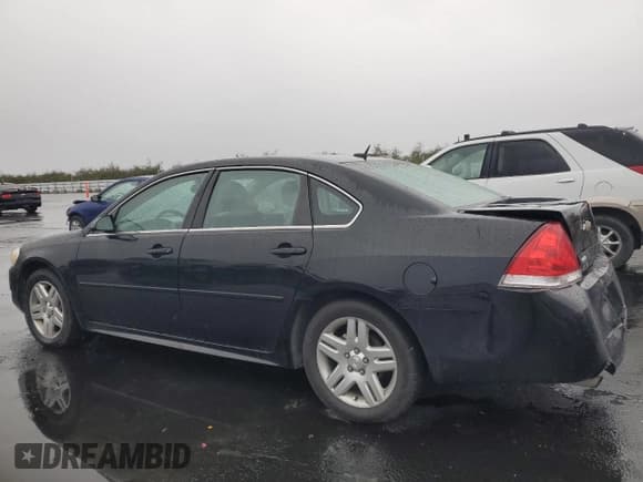 ✅ 2014 Chevrolet Impala LT • VIN: 2G1WB5E31E1137859 • Lot: 93040455. Listed on Copart with 172,747 mi. Free auction sales archive from the USA and detailed vehicle history report at DreamBid. Image 2.