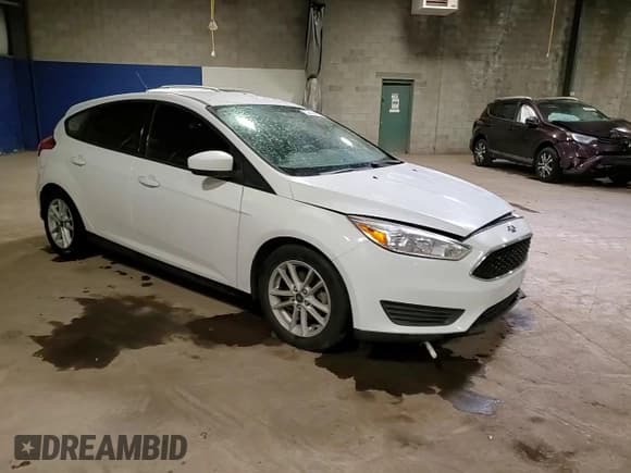 ✅ 2018 Ford Focus SE • VIN: 1FADP3K24JL208935 • Лот: 53633965. Опубликован ранее на Copart с пробегом 171 683 миль. Бесплатный доступ к архиву аукционных продаж из США и подробный отчёт об истории автомобиля на DreamBid. Изображение 13.