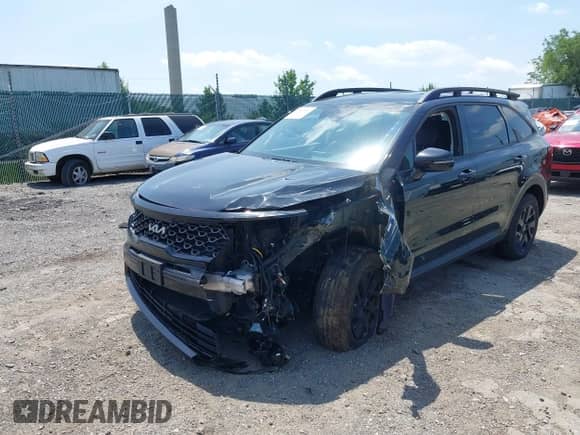 2022 Kia Sorento X-Line S z VIN 5XYRLDLC9NG149780, wystawiony jako IAAI lot #42567100 z przebiegiem 62 097 mil mil oraz . Historia ofert i sprzedaży dostępna na DreamBid. Obrazek 6.