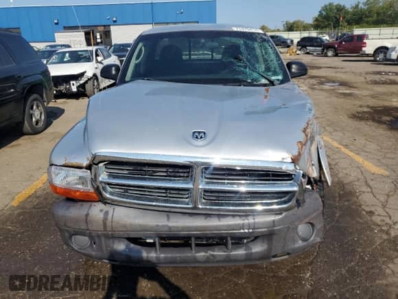 2004 Dodge Dakota z VIN 1D7GL12K94S595067, wystawiony jako Copart lot #71470414 z przebiegiem 157 284 mil mil oraz Czysty tytuł • Clean title. Historia ofert i sprzedaży dostępna na DreamBid. Obrazek 5.