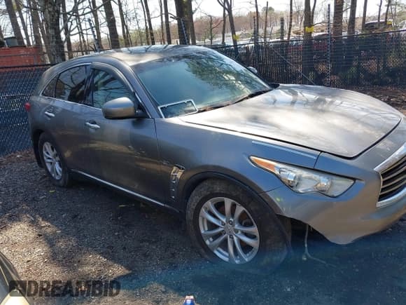 ✅ 2014 Infiniti QX70 • VIN: JN8CS1MW9EM413406 • Лот: 41909387. Опубликован ранее на IAAI с пробегом 123 957 миль. Бесплатный доступ к архиву аукционных продаж из США и подробный отчёт об истории автомобиля на DreamBid. Изображение 6.