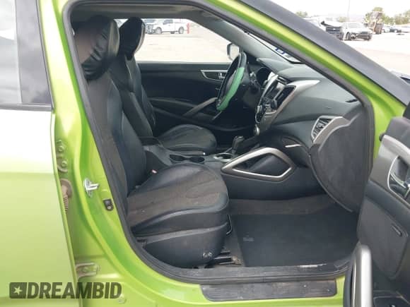 2012 Hyundai Veloster w/Gray Int с VIN KMHTC6AD6CU052668, выставлен на аукционе IAAI как лот 43165096 с пробегом 156 135 миль миль и . История ставок и продаж доступна на DreamBid. Изображение 5.