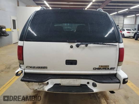 1998 Chevrolet Blazer LT с VIN 1GNDT13W5W2158448, выставлен на аукционе Copart как лот 51223255 с пробегом 298 952 миль миль и Списание • Salvage title. История ставок и продаж доступна на DreamBid. Изображение 6.