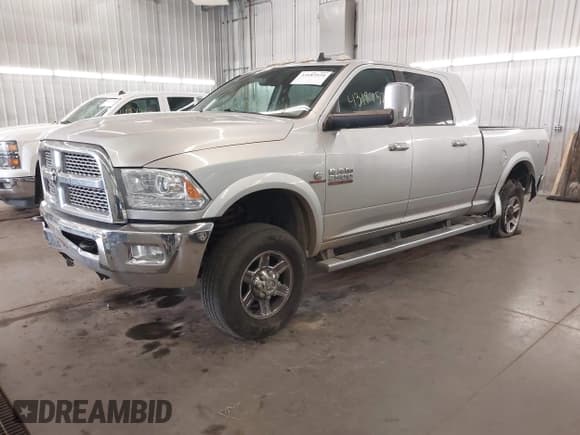 ✅ 2013 Ram 2500 Laramie • VIN: 3C6UR5NL6DG617452 • Lot: 43187524. Listed on IAAI with 176,582 mi. Free auction sales archive from the USA and detailed vehicle history report at DreamBid. Image 2.