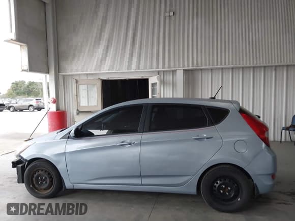 ✅ 2014 Hyundai Accent GS • VIN: KMHCT5AE5EU183872 • Lot: 43828884. Listed on IAAI with 121,613 mi. Free auction sales archive from the USA and detailed vehicle history report at DreamBid. Image 15.