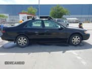 ✅ 1998 Toyota Camry LE • VIN: JT2BF28KXW0118504 • Lot: 42096672. Listed on IAAI with 257,358 mi. Free auction sales archive from the USA and detailed vehicle history report at DreamBid. Image 13.