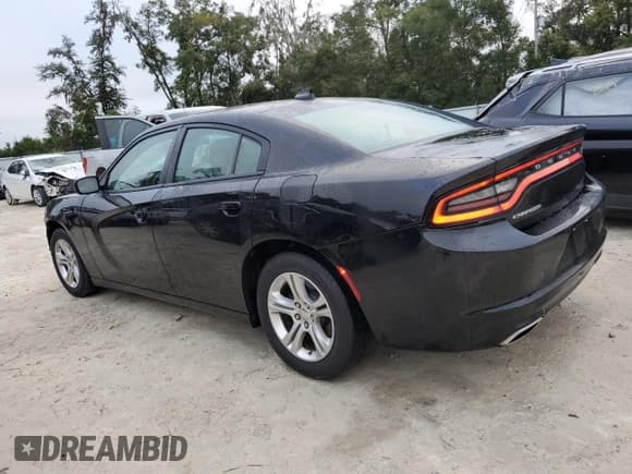 ✅ 2023 Dodge Charger SXT • VIN: 2C3CDXBG5PH663238 • Lot: 90501795. Wystawiony na Copart z przebiegiem 50 017 mil. Bezpłatny archiwum sprzedaży aukcyjnych z USA i szczegółowy raport historii pojazdu na DreamBid. Zdjęcie 2.