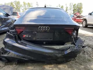 ✅ 2016 Audi RS 7 Prestige • VIN: WUAW2AFC7GN904309 • Лот: 61766944. Опубликован ранее на Copart с пробегом 54 914 миль. Бесплатный доступ к архиву аукционных продаж из США и подробный отчёт об истории автомобиля на DreamBid. Изображение 6.
