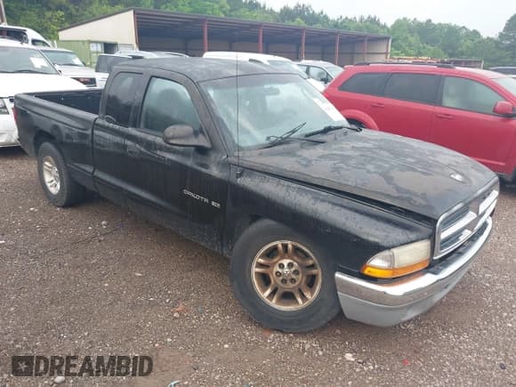 ✅ 2001 Dodge Dakota • VIN: 1B7GL22X71S100324 • Lot: 42287463. Wystawiony na IAAI z przebiegiem 166 584 mil. Bezpłatny archiwum sprzedaży aukcyjnych z USA i szczegółowy raport historii pojazdu na DreamBid. Zdjęcie 1.
