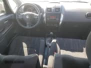 ✅ 2010 Suzuki SX4 • VIN: JS2YB5A38A6310078 • Лот: 90674615. Опубликован ранее на Copart с пробегом 46 250 миль. Бесплатный доступ к архиву аукционных продаж из США и подробный отчёт об истории автомобиля на DreamBid. Изображение 8.