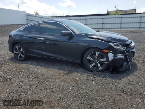 ✅ 2017 Honda Civic Touring • VIN: 2HGFC3B9XHH351182 • Lot: 62740035. Listed on Copart with 137,297 mi. Free auction sales archive from the USA and detailed vehicle history report at DreamBid. Image 4.