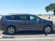 ✅ 2018 Chrysler Pacifica Hybrid Touring L • VIN: 2C4RC1L71JR129532 • Lot: 42064129. Listed on IAAI with 129,665 mi. Free auction sales archive from the USA and detailed vehicle history report at DreamBid. Image 13.