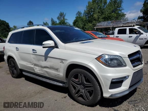 ✅ 2014 Mercedes-Benz GL 63 AMG • VIN: 4JGDF7EE0EA335978 • Lot: 63092745. Wystawiony na Copart z przebiegiem 127 083 mil. Bezpłatny archiwum sprzedaży aukcyjnych z USA i szczegółowy raport historii pojazdu na DreamBid. Zdjęcie 4.