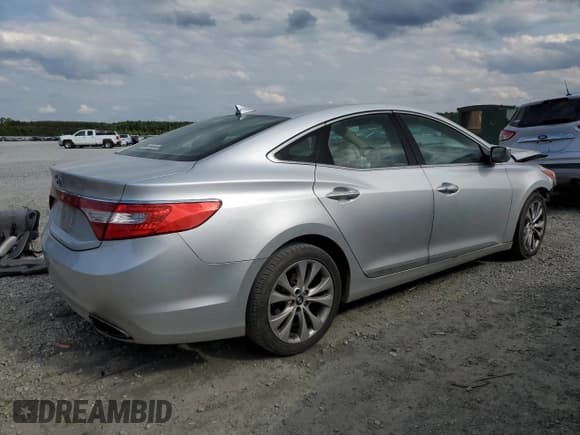 ✅ 2013 Hyundai Azera • VIN: KMHFG4JG8DA267486 • Лот: 60360925. Опубликован ранее на Copart с пробегом 161 524 миль. Бесплатный доступ к архиву аукционных продаж из США и подробный отчёт об истории автомобиля на DreamBid. Изображение 3.