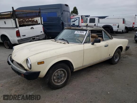 ✅ 1980 FIAT 124 Spider • VIN: 124CS000165091 • Lot: 72478654. Wystawiony na Copart z przebiegiem 10 397 mil. Bezpłatny archiwum sprzedaży aukcyjnych z USA i szczegółowy raport historii pojazdu na DreamBid. Zdjęcie 1.