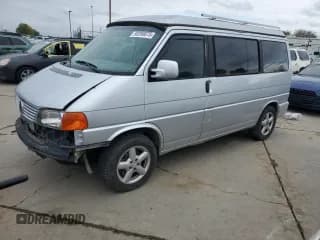 ✅ 2003 Volkswagen EuroVan MV • VIN: WV2NB47053H008065 • Лот: 93288075. Опубликован ранее на Copart с пробегом 197 222 миль. Бесплатный доступ к архиву аукционных продаж из США и подробный отчёт об истории автомобиля на DreamBid. Изображение 1.