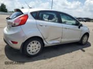 ✅ 2014 Ford Fiesta S • VIN: 3FADP4TJ9EM131799 • Lot: 62911165. Listed on Copart with 64,732 mi. Free auction sales archive from the USA and detailed vehicle history report at DreamBid. Image 3.