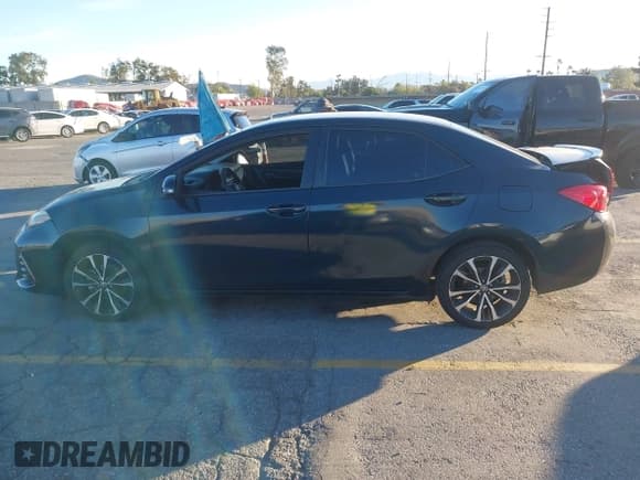✅ 2018 Toyota Corolla LE • VIN: 5YFBURHE4JP820235 • Lot: 43797752. Listed on IAAI with 98,162 mi. Free auction sales archive from the USA and detailed vehicle history report at DreamBid. Image 14.