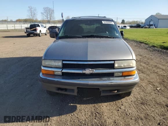 ✅ 1999 Chevrolet Blazer Trailblazer • VIN: 1GNDT13W0X2122216 • Lot: 54400065. Wystawiony na Copart z przebiegiem 100 260 mil. Bezpłatny archiwum sprzedaży aukcyjnych z USA i szczegółowy raport historii pojazdu na DreamBid. Zdjęcie 5.