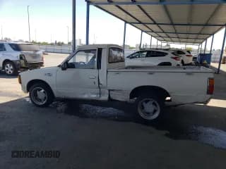 ✅ 1983 Nissan 720 • VIN: JN6ND01S5DW007004 • Lot: 60468475. Wystawiony na Copart z przebiegiem 276 470 mil. Bezpłatny archiwum sprzedaży aukcyjnych z USA i szczegółowy raport historii pojazdu na DreamBid. Zdjęcie 2.