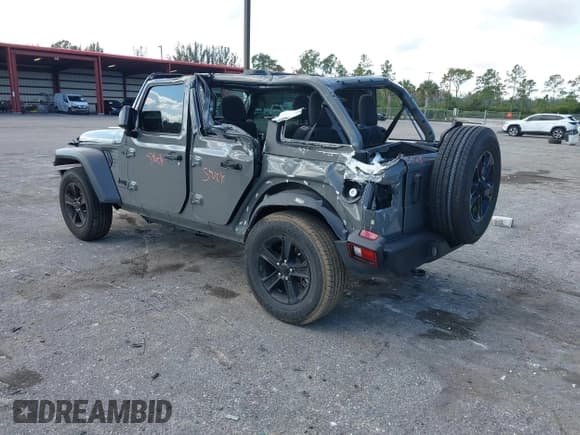 ✅ 2023 Jeep Wrangler Sport • VIN: 1C4HJXDG2PW677154 • Lot: 43756077. Listed on IAAI with 35,896 mi. Free auction sales archive from the USA and detailed vehicle history report at DreamBid. Image 3.
