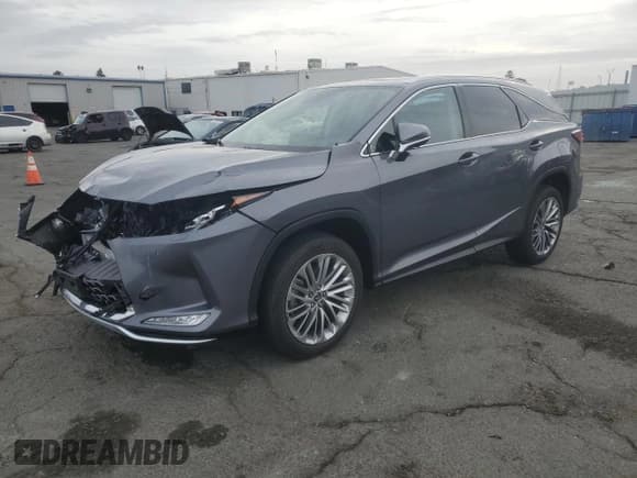 ✅ 2021 Lexus RX 450hL Luxury • VIN: JTJJGKFA3M2018186 • Lot: 79238834. Wystawiony na Copart z przebiegiem 87 855 mil. Bezpłatny archiwum sprzedaży aukcyjnych z USA i szczegółowy raport historii pojazdu na DreamBid. Zdjęcie 1.