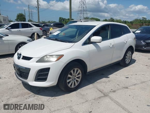 ✅ 2010 Mazda CX-7 SV • VIN: JM3ER2W57A0302890 • Lot: 42010326. Wystawiony na IAAI z przebiegiem 115 076 mil. Bezpłatny archiwum sprzedaży aukcyjnych z USA i szczegółowy raport historii pojazdu na DreamBid. Zdjęcie 2.