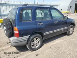2003 Chevrolet Tracker с VIN 2CNBE13C036926265, выставлен на аукционе Copart как лот 67719825 с пробегом 160 590 миль миль и Списание • Salvage title. История ставок и продаж доступна на DreamBid. Изображение 3.