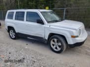 ✅ 2014 Jeep Patriot Latitude • VIN: 1C4NJPFB1ED889282 • Lot: 52318265. Listed on Copart with 122,271 mi. Free auction sales archive from the USA and detailed vehicle history report at DreamBid. Image 4.