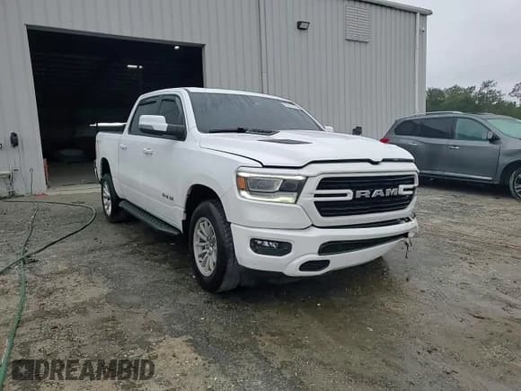 ✅ 2023 Ram 1500 Laramie • VIN: 1C6SRFJT7PN651656 • Lot: 90226755. Wystawiony na Copart z przebiegiem 32 125 mil. Bezpłatny archiwum sprzedaży aukcyjnych z USA i szczegółowy raport historii pojazdu na DreamBid. Zdjęcie 13.