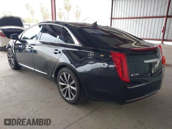 ✅ 2013 Cadillac XTS Livery • VIN: 2G61W5S33D9164395 • Lot: 41793791. Listed on IAAI with 421,499 mi. Free auction sales archive from the USA and detailed vehicle history report at DreamBid. Image 3.