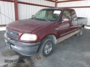 ✅ 1997 Ford F-150 • VIN: 1FTDX1760VKA67836 • Lot: 43518241. Listed on IAAI with 259,458 mi. Free auction sales archive from the USA and detailed vehicle history report at DreamBid. Image 2.