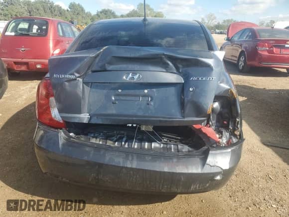 2009 Hyundai Accent Auto GLS z VIN KMHCN46C39U288766, wystawiony jako Copart lot #73111784 z przebiegiem 245 650 mil mil oraz Szkoda całkowita • Salvage title. Historia ofert i sprzedaży dostępna na DreamBid. Obrazek 6.