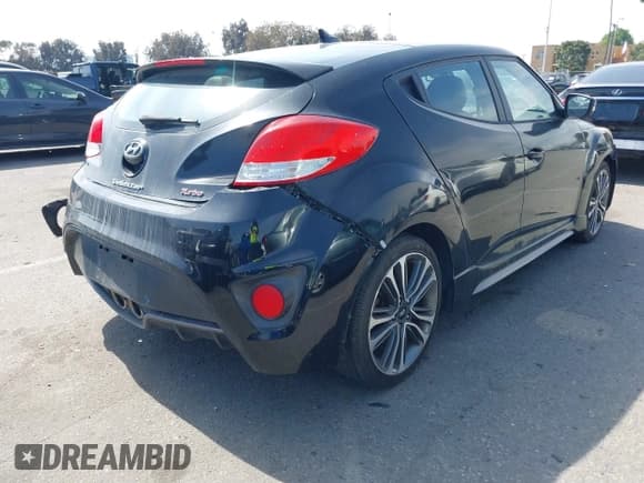 ✅ 2016 Hyundai Veloster Turbo Rally Edition • VIN: KMHTC6AE8GU255625 • Lot: 41754607. Wystawiony na IAAI z przebiegiem 94 011 mil. Bezpłatny archiwum sprzedaży aukcyjnych z USA i szczegółowy raport historii pojazdu na DreamBid. Zdjęcie 4.