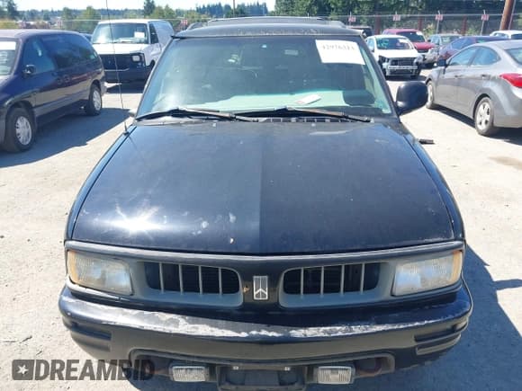 ✅ 1996 Oldsmobile Bravada • VIN: 1GHDT13W8T2706456 • Lot: 42976313. Listed on IAAI with Not provided. Free auction sales archive from the USA and detailed vehicle history report at DreamBid. Image 6.