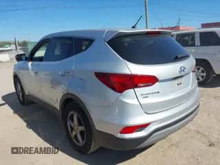 2018 Hyundai Santa Fe 2.4L z VIN 5XYZT3LB5JG563330, wystawiony jako IAAI lot #43397944 z przebiegiem 124 663 mil mil oraz . Historia ofert i sprzedaży dostępna na DreamBid. Obrazek 3.