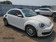 ✅ 2013 Volkswagen Beetle 2.5L • VIN: 3VWHX7AT2DM656457 • Lot: 63814944. Listed on Copart with 92,966 mi. Free auction sales archive from the USA and detailed vehicle history report at DreamBid. Image 4.