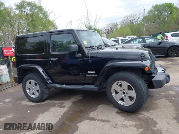 ✅ 2011 Jeep Wrangler Sahara • VIN: 1J4GA5D1XBL559112 • Лот: 42002738. Опубликован ранее на IAAI с пробегом 107 759 миль. Бесплатный доступ к архиву аукционных продаж из США и подробный отчёт об истории автомобиля на DreamBid. Изображение 13.
