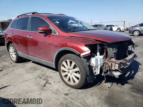 ✅ 2010 Mazda CX-9 Grand Touring • VIN: JM3TB2MV2A0202999 • Лот: 68116945. Опубликован ранее на Copart с пробегом 195 944 миль. Бесплатный доступ к архиву аукционных продаж из США и подробный отчёт об истории автомобиля на DreamBid. Изображение 4.