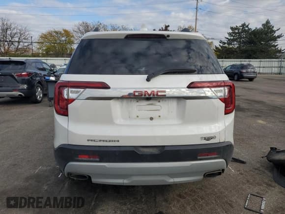 ✅ 2021 GMC Acadia SLT • VIN: 1GKKNMLS4MZ167305 • Lot: 90289695. Listed on Copart with 74,484 mi. Free auction sales archive from the USA and detailed vehicle history report at DreamBid. Image 6.