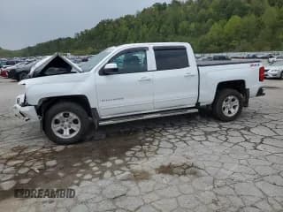 ✅ 2018 Chevrolet Silverado 1500 LT • VIN: 3GCUKREC5JG401737 • Лот: 70502254. Опубликован ранее на Copart с пробегом Не указан. Бесплатный доступ к архиву аукционных продаж из США и подробный отчёт об истории автомобиля на DreamBid. Изображение 1.