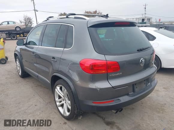 ✅ 2013 Volkswagen Tiguan S • VIN: WVGBV3AX3DW577045 • Lot: 43811665. Listed on IAAI with 161,847 mi. Free auction sales archive from the USA and detailed vehicle history report at DreamBid. Image 3.