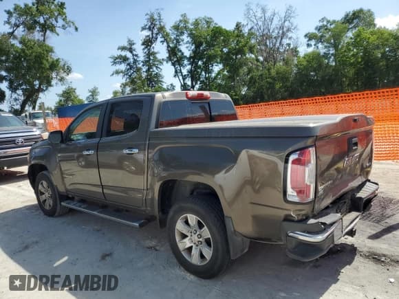 ✅ 2015 GMC Canyon 2WD SLE • VIN: 1GTG5BE33F1187378 • Lot: 55548655. Listed on Copart with 121,519 mi. Free auction sales archive from the USA and detailed vehicle history report at DreamBid. Image 2.