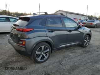 2020 Hyundai Kona Ultimate z VIN KM8K5CA57LU449500, wystawiony jako Copart lot #68497752 z przebiegiem 10 106 mil mil oraz . Historia ofert i sprzedaży dostępna na DreamBid. Obrazek 3.