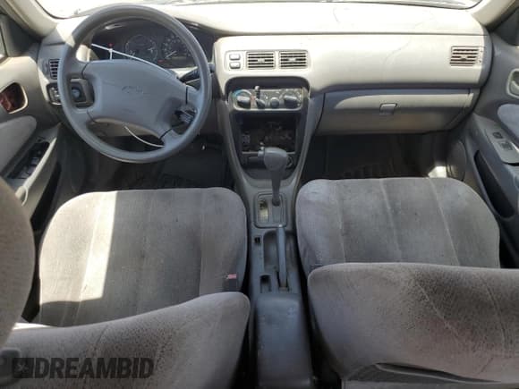 ✅ 1998 Chevrolet Prizm Lsi • VIN: 1Y1SK528XWZ413398 • Lot: 58322005. Listed on Copart with 191,792 mi. Free auction sales archive from the USA and detailed vehicle history report at DreamBid. Image 8.